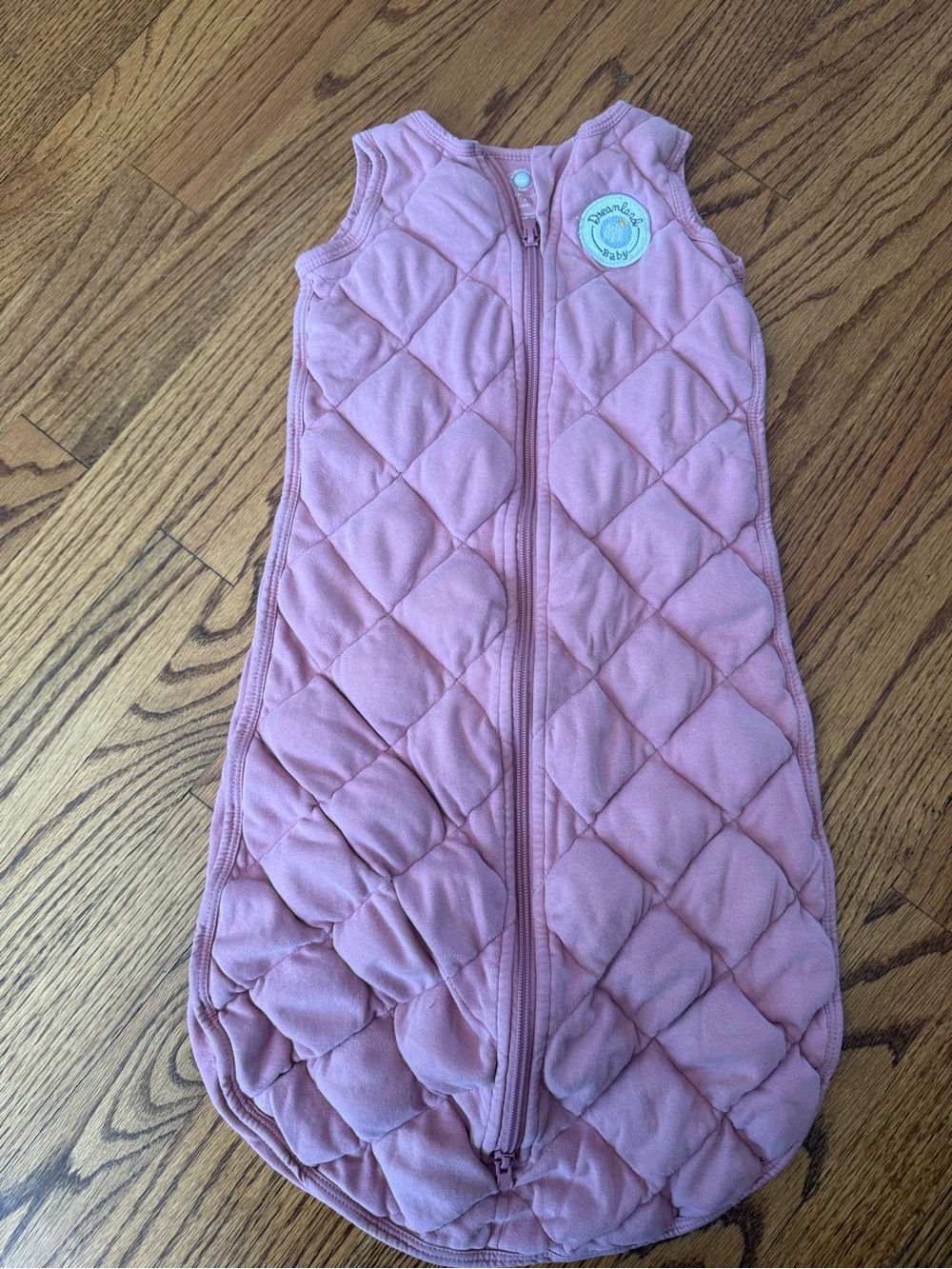 Light Pink Dreamland Baby Sleep Sack weighted
Size 6-12 months